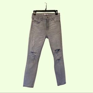 Distressed light gray skinny jeans